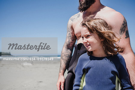 Father and daughter on beach, Tofino, Canada