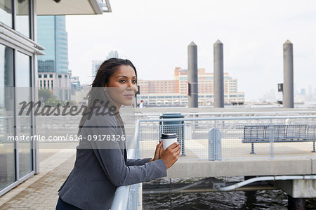 Businesswoman taking coffee break