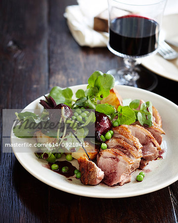 Duck salad with pinot jus and vegetables