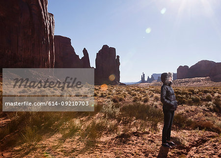 Female tourist alone in Monument Valley, Navajo Tribal Park, Arizona, USA