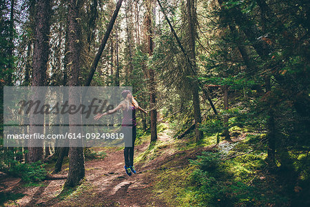 Hiker enjoying forest, Johnston Canyon trail, Banff, Canada