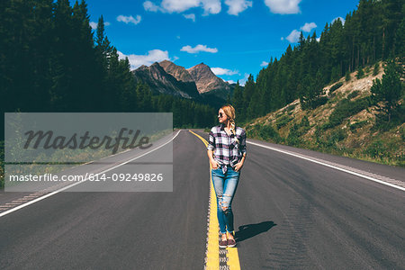 Woman in middle of road, Jasper, Canada
