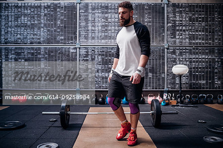 Young man working out in gym