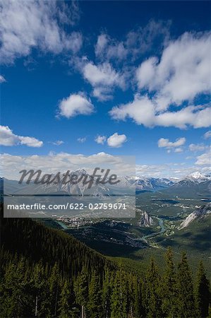 Snow-Capped Mountains against Cloudy Sky