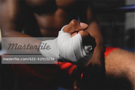 Boxer's hand wrapped in bandage