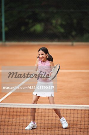 Caucasian Girl Playing Tennis