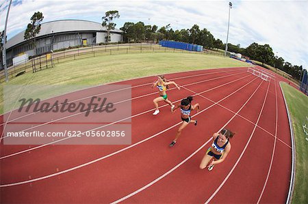 Female Runners on Racing Track