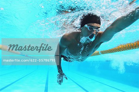 Man Swimming in Pool, Underwater