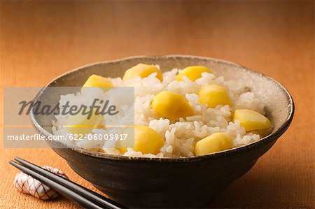 Bowl Of Fresh Hot Food With Chopsticks