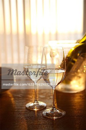 Close Up Of Two Drinking Glass Half Filled With Drink