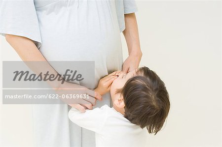 Pregnant woman and boy