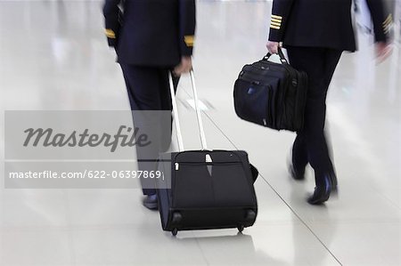 Two pilots walking at the airport