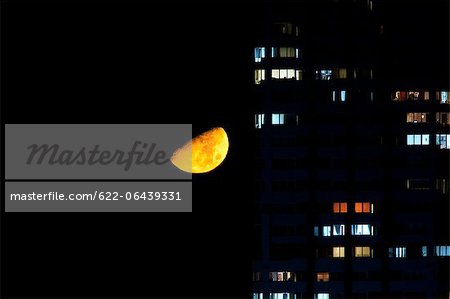 Half moon and apartment lights
