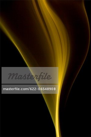 Yellow smoke on black background Yellow smoke on black background