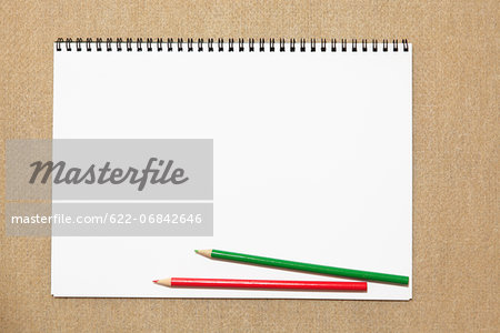 Colored pencils and sketchbook - Stock Photo - Masterfile - Premium  Royalty-Free, Code: 622-06842646