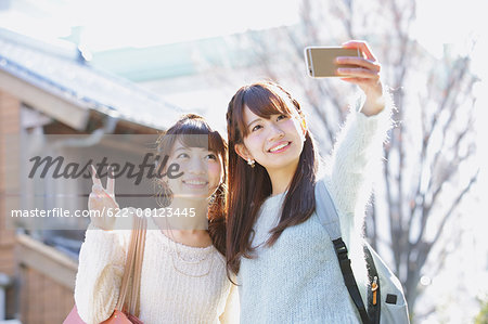 Young Japanese women enjoying trip in Kawagoe, Japan