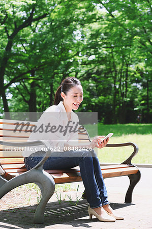 Japanese attractive woman in a city park