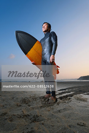 Japanese surfer portrait on the beach