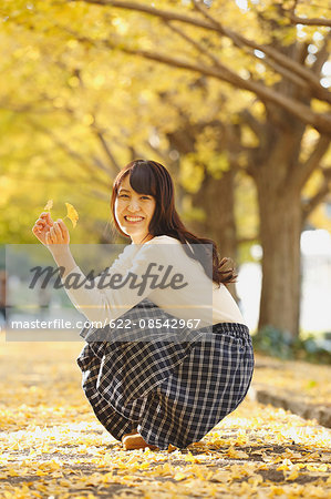 Young Japanese woman in a city park