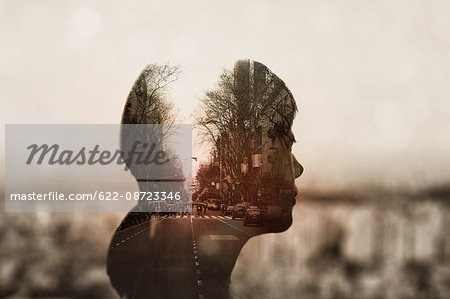 Double exposure of young woman and cityscape Double exposure of young woman and cityscape