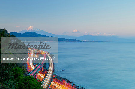 Night view of Mount Fuji and highway from Satta ridge at sunset, Shizuoka Prefecture, Japan Night view of Mount Fuji and highway from Satta ridge at sunset, Shizuoka Prefecture, Japan