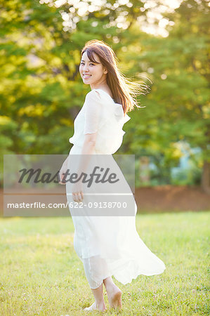 Attractive Japanese woman in a city park