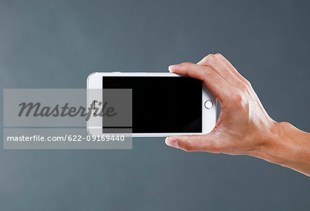 Hand holding smartphone