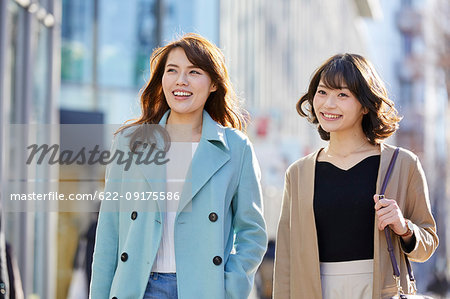 Japanese women window shopping downtown Tokyo