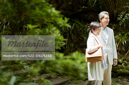 Japanese senior couple having fun at traditional inn