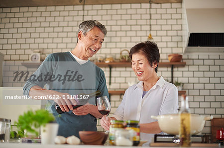 Japanese senior couple in the kitchen