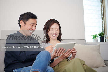 Japanese Mature Couple On The Sofa Stock Photo Masterfile Premium Royalty Free Code 622