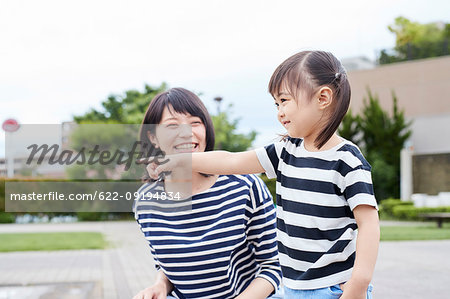 Japanese Mother And Daughter At A City Park Stock Photo Masterfile Premium Royalty Free Code 622 09194834