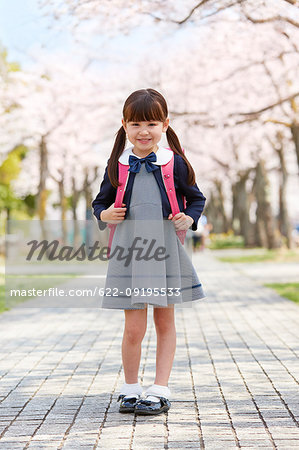 Japanese schoolgirls in their uniforms with cherry blossoms in the  background, Stock Photo, Picture And Rights Managed Image. Pic.  AFL-JJIE008567