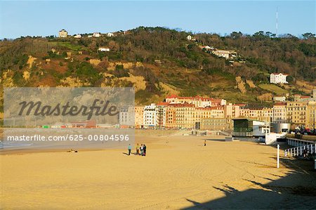 High angle view of a group of people standing on a beach, Spain