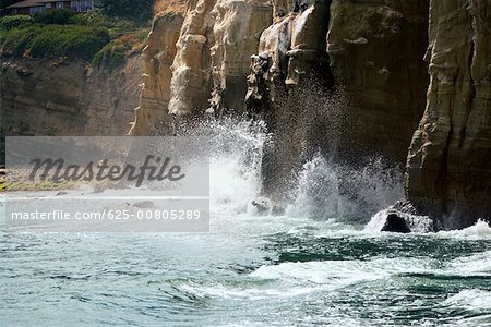Waves crashing against a rock, La Jolla reefs, San Diego Bay, California, USA