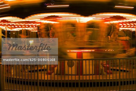 Carousel in an amusement park at night, San Diego, California, USA