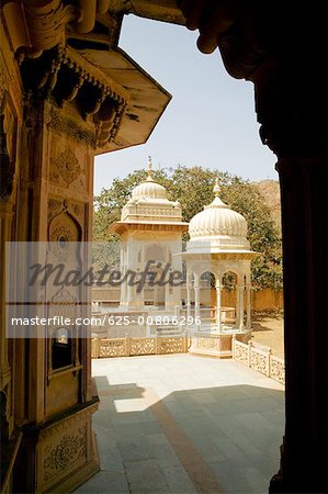 Building viewed from an arched doorway, Royal Gaitor, Jaipur, Rajasthan, India