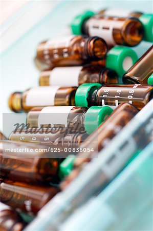 High angle view of glass vials