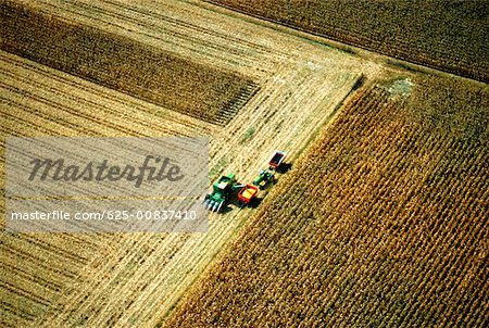 Aerial view of combine harvesting corn, Clinton county, OH