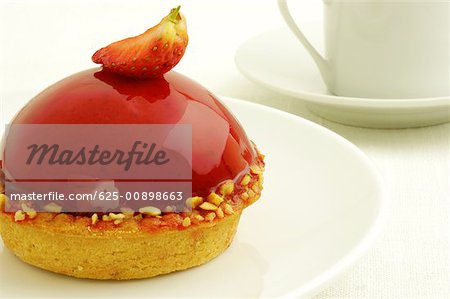 Close-up of a strawberry tart in a plate