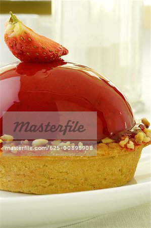 Close-up of a strawberry tart in a plate