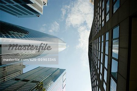 Low angle view of skyscrapers in a city, Chicago, Illinois, USA