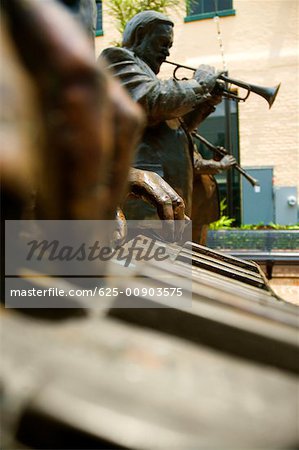 Close-up of statues of three musicians playing musical instruments, New Orleans, Louisiana, USA