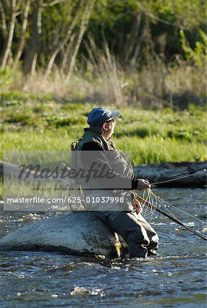 Premium Photo  Gentleman in River Fishing Gear