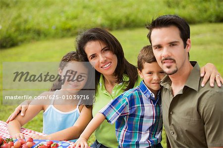 Portrait of parents with their children