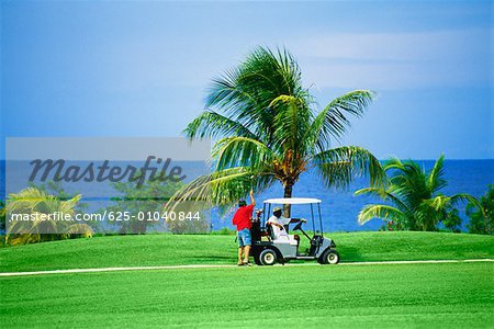 A golf cart is seen on a golfcourse at Wyndham Resort, Jamaica