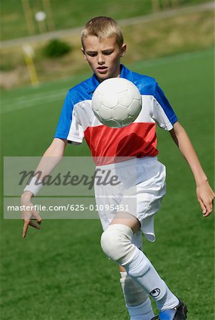 Close Up Of A Soccer Player Playing With A Soccer Ball Stock Photo Masterfile Premium Royalty Free Code 625