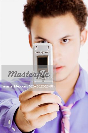 Close-up of a businessman taking a picture of himself