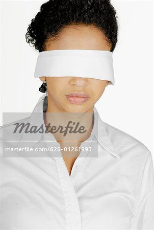 Close-up of a businesswoman blindfolded