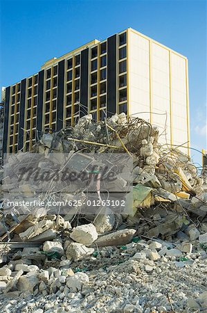 Low angle view of rubble in front of a building